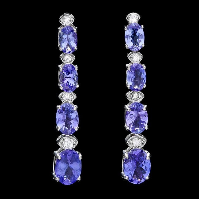 14k Gold 5ct Tanzanite 0.35ct Diamond Earrings: Retail: $4,980.00 ****** 14k Gold 5ct Tanzanite 0.35ct Diamond Earrings ****** Metal: 14k Solid White Gold / Total Item Weight: 4.5 grams / Country Made: United States / / Main Stone: Tanzanite / Colo