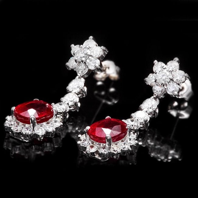 14k Gold 5.00ct Ruby 2.50ct Diamond Earrings: Retail: $13,200.00 ****** 14k Gold 5.00ct Ruby 2.50ct Diamond Earrings ****** Metal: 14k Solid White Gold / Total Item Weight: 5.5 grams / Country Made: United States / / Main Stone: Ruby / Color: Red