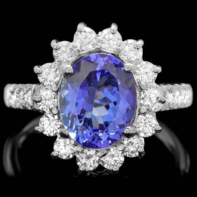 18k Gold 3.00ct Tanzanite 1.05ct Diamond Ring: Retail: $9,300.00 ****** 18k Gold 3.00ct Tanzanite 1.05ct Diamond Ring ****** Metal: 18k Solid White Gold / Size: 7 / Total Item Weight: 6.0 grams / / Main Stone: Tanzanite / Color: Purple / Carat
