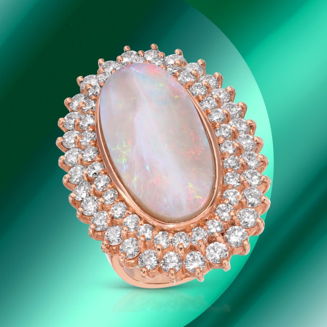 14k Gold 10.53ct Opal 3.66ct Diamond Ring: Retail: $28,300.00 ****** 14k Gold 10.53ct Opal 3.66ct Diamond Ring ****** Metal: 14k Solid Rose Gold / Size: 7 / Total Item Weight: 18.1 grams / Country Made: USA / / Main Stone: Opal / Color: / Cara