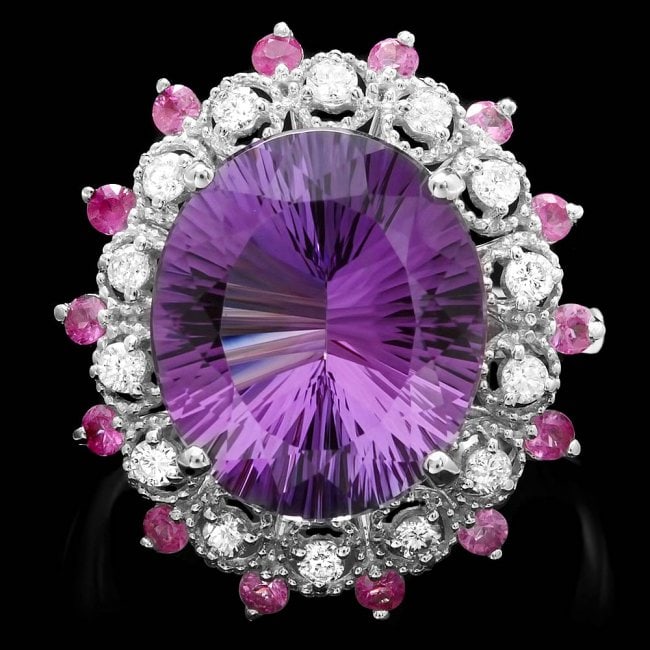 14k Gold 6.50ct Amethyst 0.35ct Diamond Ring: Retail: $5,000.00 ****** 14k Gold 6.50ct Amethyst 0.35ct Diamond Ring ****** Metal: 14k Solid White Gold / Size: 7.5 / Total Item Weight: 6 grams / Country Made: United States / / Main Stone: Amethyst