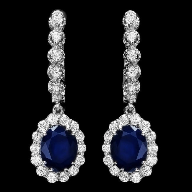 14k Gold 5.21ct Sapphire 1.26ct Diamond Earrings: Retail: $6,800.00 ****** 14k Gold 5.21ct Sapphire 1.26ct Diamond Earrings ****** Metal: 14k Solid White Gold / Total Item Weight: 5.6 grams / Country Made: United States / / Main Stone: Sapphire / Col