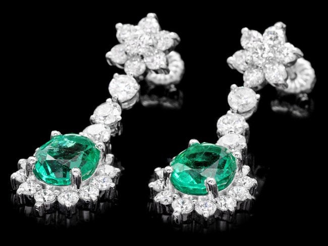 14k Gold 4ct Emerald 3.20ct Diamond Earrings: Retail: $18,400.00 ****** 14k Gold 4ct Emerald 3.20ct Diamond Earrings ****** Metal: 14k Solid White Gold / Total Item Weight: 6.0 grams / Country Made: United States / / Main Stone: Emerald / Color: 