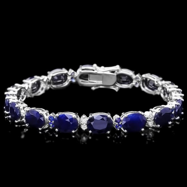 14k Gold 35.8ct Sapphire 0.75ct Diamond Bracelet: Retail: $17,500.00 ****** 14k Gold 35.8ct Sapphire 0.75ct Diamond Bracelet ****** Metal: 14k Solid White Gold / Size: 7.5 / Total Item Weight: 20 grams / Country Made: United States / / Main Stone: Sa