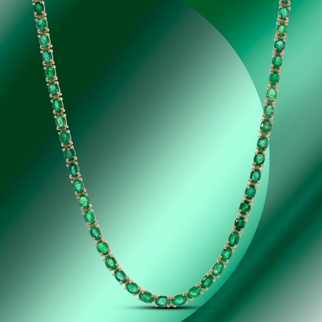 14k Gold 17.79ctc Emerald Necklace: Retail: $23,475*****14K Gold Emerald Necklace*****Metal: 14K Yellow Gold/ Total Wt.:20.6g / Country Made US// Main Stone: Emerald / Carat Total Wt.: 17.79cts / Treatment: None/ Color: Green / Cut: Goo