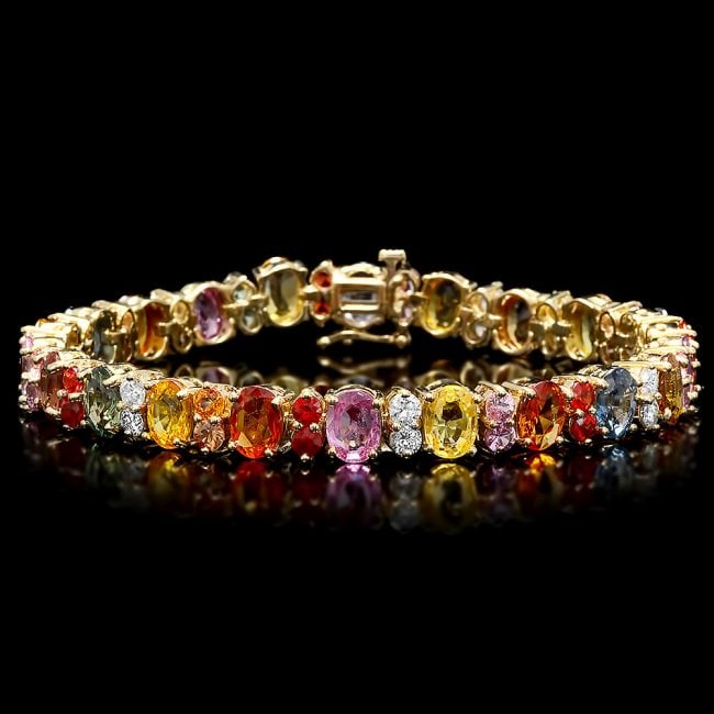 14k Gold 23ct Sapphire 1.50ct Diamond Bracelet: Retail: $14,800.00 ****** 14k Gold 23ct Sapphire 1.50ct Diamond Bracelet ****** Metal: 14k Solid Yellow Gold / Size: 7.5 / Total Item Weight: 24.5 grams / Country Made: United States / / Main Stone: S