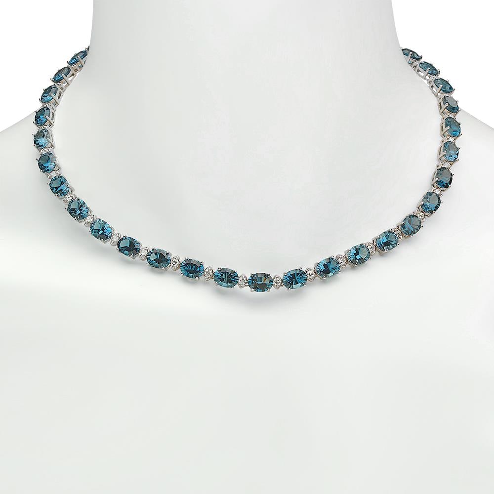 14K Gold 52.70ct Topaz 2.40ct Diamond Necklace: Retail: $19,930.00 ****** 14K Gold 52.70ct Blue Topaz 2.40ct Diamond Necklace ****** Metal: 14K Solid Gold / Total Item Weight: 33.2 grams / Country Made: United States / / Main Stone: Blue Topaz / Co