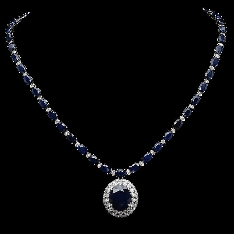 14K Gold 50.77 ct Sapphire & 3.27 ct Diamond Necklace: Retail: $31,176.00******14K Gold Sapphire & Diamond Necklace****** Metal: 14K Solid White Gold / Total Item Weight: 32.8 grams/ Country Made: United States / / Main Stone: Sapphire / Color: Dark Blue 