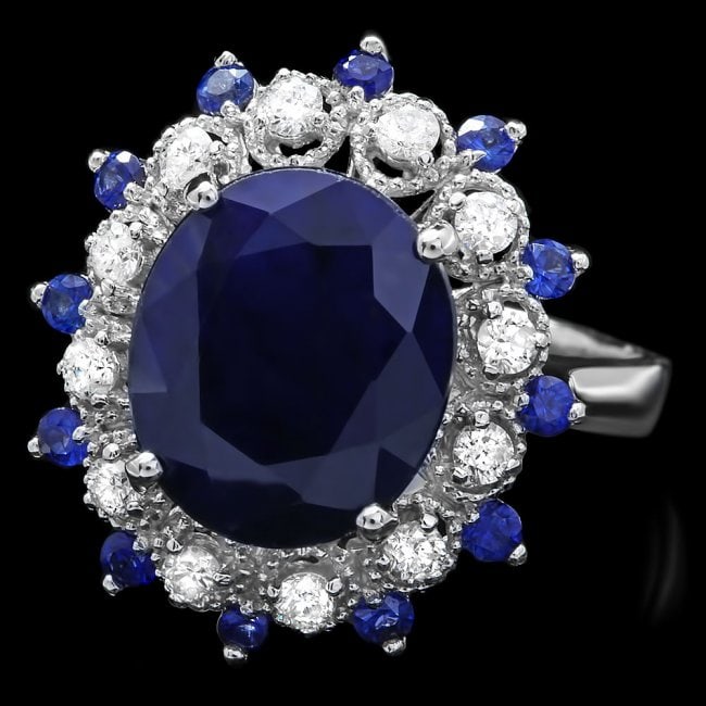 14k White Gold 5.4ct Sapphire 0.35ct Diamond Ring: Retail: $5,500.00 ****** 14k White Gold 5.4ct Sapphire 0.35ct Diamond Ring ****** Metal: 14k Solid White Gold / Size: 7.25 / Total Item Weight: 5.0 grams / Country Made: United States / / Main Stone: 