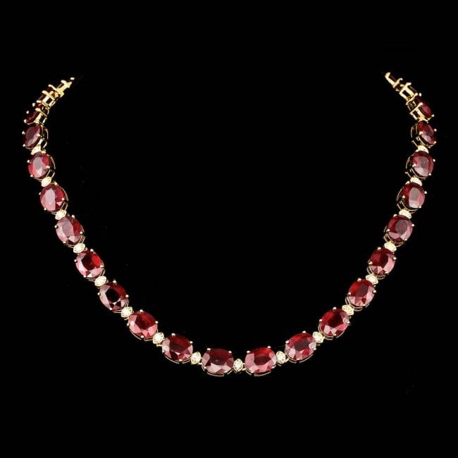18k Gold 115.00ct Ruby 1.85ct Diamond Necklace: Retail: $67,500.00 ****** 18k Gold 115.00ct Ruby 1.85ct Diamond Necklace ****** Metal: 18k Solid Yellow Gold / Size: 17 / Total Item Weight: 54.5 grams / / Main Stone: Ruby / Color: Red / Carat Total 