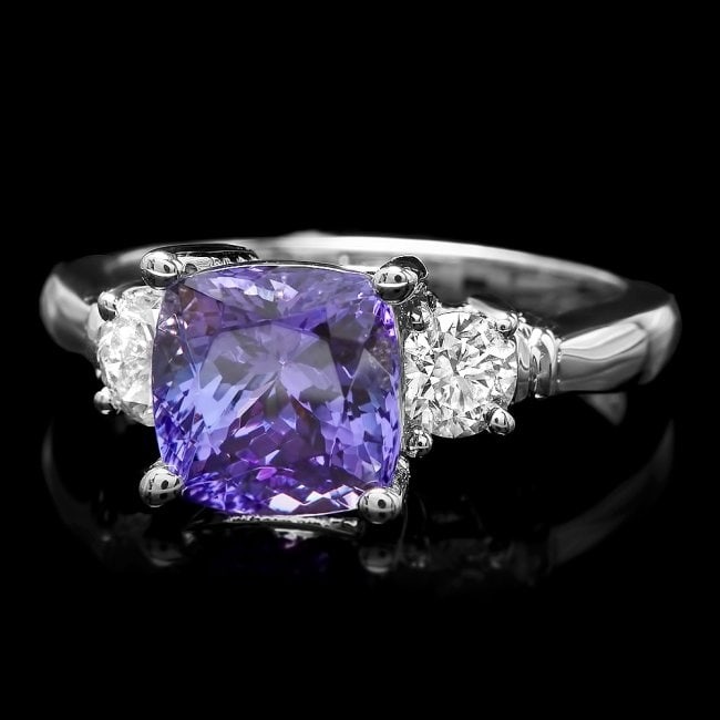 14k Gold 3.00ct Tanzanite 0.60ct Diamond Ring: Retail: $8,400.00 ****** 14k Gold 3.00ct Tanzanite 0.60ct Diamond Ring ****** Metal: 14k Solid White Gold / Size: 7 / Total Item Weight: 5.0 grams / Country Made: United States / / Main Stone: Tanzani