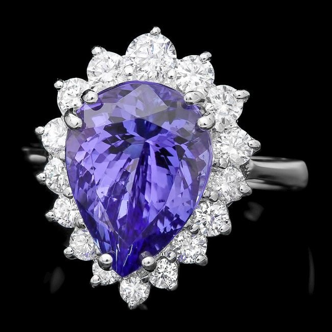 14k Gold 5.50ct Tanzanite 1.00ct Diamond Ring: Retail: $9,500.00 ****** 14k Gold 5.50ct Tanzanite 1.00ct Diamond Ring ****** Metal: 14k Solid White Gold / Size: 7.25 / Total Item Weight: 6 grams / Country Made: United States / / Main Stone: Tanzan