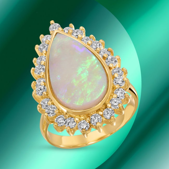 14k Gold 3.40ct Opal 0.98ct Diamond Ring: Retail: $8,382.00 ****** 14k Gold 3.40ct Opal 0.98ct Diamond Ring ****** Metal: 14k Solid Yellow Gold / Size: 7 / Total Item Weight: 7.3 grams / Country Made: USA / / Main Stone: Opal / Color: White /