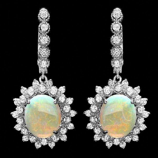 14k Gold 4.50ct Opal 1.90ct Diamond Earrings: Retail: $8,900.00 ****** 14k Gold 4.50ct Opal 1.90ct Diamond Earrings ****** Metal: 14k Solid White Gold / Total Item Weight: 8.5 grams / Country Made: United States / / Main Stone: Opal / Color: Whit