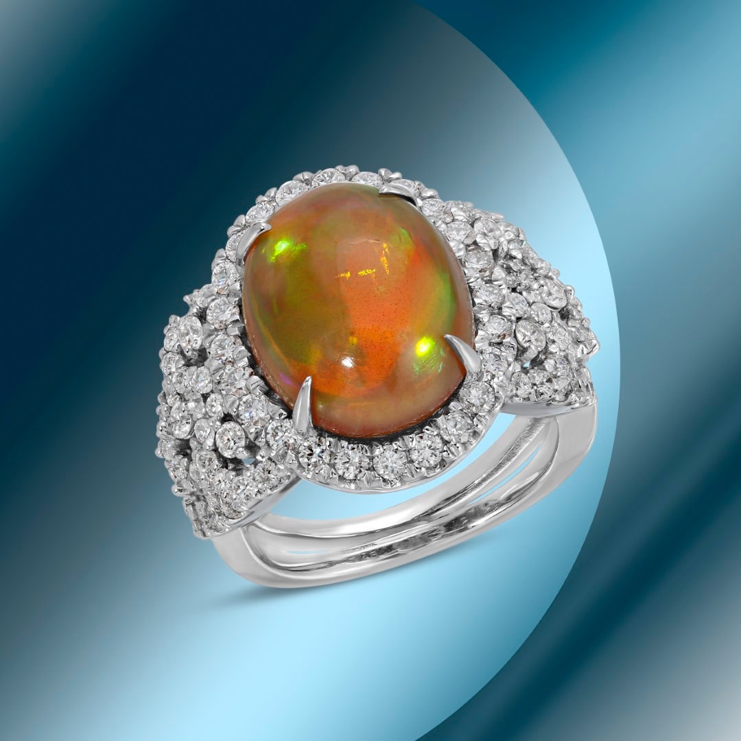 14K Gold 6.52cts Opal & 1.72cts Diamond Ring: Retail: $15,374***** 14K Gold 6.52cts Opal & 1.72cts Diamond Ring****** Metal: 14K White Gold/ Total Wt.: 10.9g/ Country Made USA// Main Stone: Opal/ Carat Total Wt: 6.52cts / Treatment: None/ Color: 
