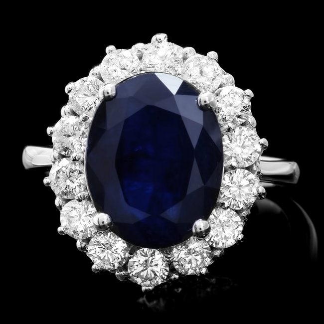 14k Gold 6.00ct Sapphire 1.40ct Diamond Ring: Retail: $8,800.00 ****** 14k Gold 6.00ct Sapphire 1.40ct Diamond Ring ****** Metal: 14k Solid White Gold / Total Item Weight: 6.5 grams / Country Made: United States / / Main Stone: Sapphire / Color: 