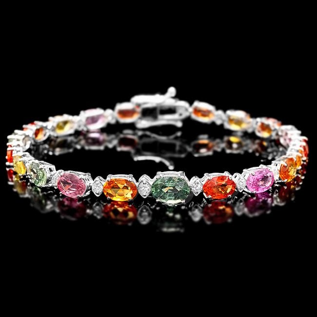 14k Gold 14ct Sapphire 0.75ct Diamond Bracelet: Retail: $9,500.00 ****** 14k Gold 14ct Sapphire 0.75ct Diamond Bracelet ****** Metal: 14k Solid White Gold / Size: 7.5 / Total Item Weight: 10.5 grams / Country Made: United States / / Main Stone: Sap