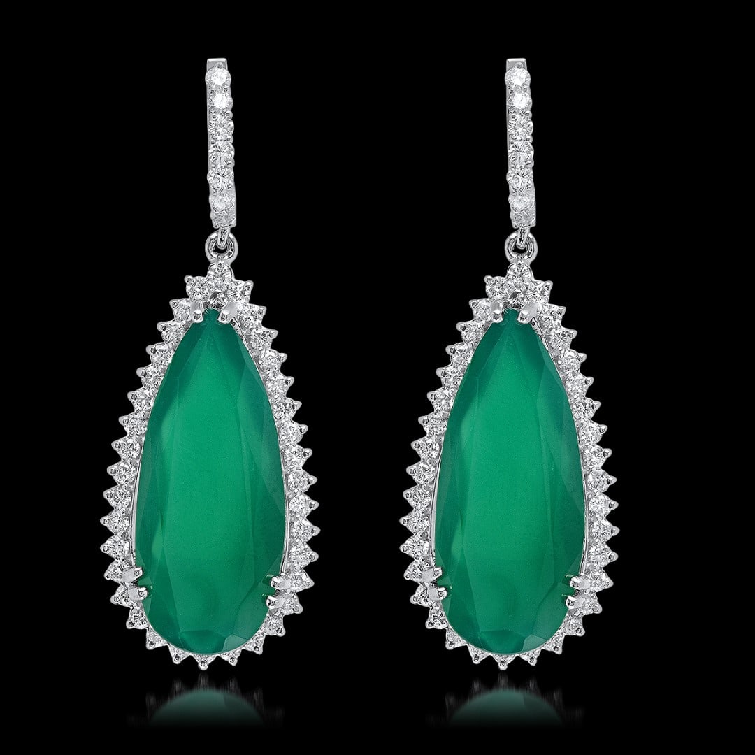 14K White Gold, 25.50cts Chalcedony & 2.91cts. Diamond Earrings: Retail: $37,990.00****** 14K White Gold,25.50cts. Chalcedony & 2.91cts.Diamond Earrings******* Metal: 14K White Gold/ Total Wt.: 20.0g/ Country Made USA/ Main Stone: Chalcedony/ Adjacent Stone: Diamon