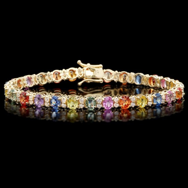 14k Gold 11ct Sapphire 1.4ct Diamond Bracelet: Retail: $14,750.00 ****** 14k Gold 11ct Sapphire 1.4ct Diamond Bracelet ****** Metal: 14k Solid Yellow Gold / Size: 7 / Total Item Weight: 13.0 grams / Country Made: United States / / Main Stone: Sapp