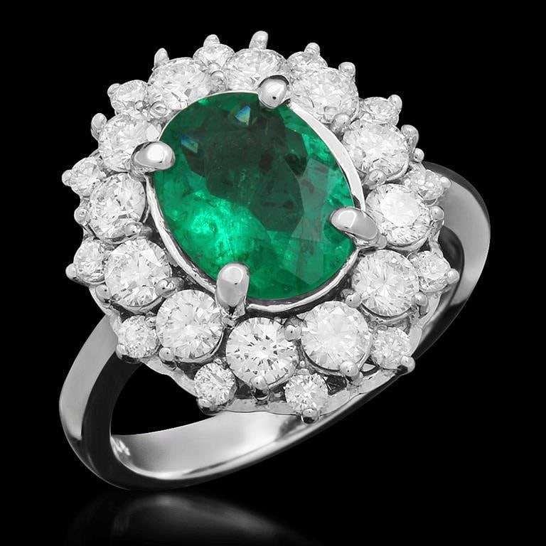 14K Gold 1.65ct Emerald 1.43ct Diamond Ring: Retail: $9,890.00 ****** 14K Gold Emerald & Diamond Ring ****** Metal: 14K Solid White Gold / Total Item Weight: 6.4 / Country Made: United States / / Main Stone: Emerald / Color: Green / Carat Total