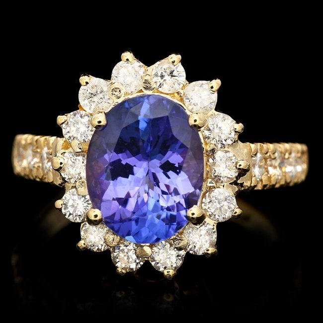 14k Gold 2.70ct Tanzanite 0.90ct Diamond Ring: Retail: $11,320.00 ****** 14k Gold 2.70ct Tanzanite 0.90ct Diamond Ring ****** Metal: 14k Solid Yellow Gold / Size: 6.5 / Total Item Weight: 5.0 grams / Country Made: United States / / Main Stone: Tan