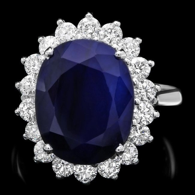 14k Gold 9.50ct Sapphire 1.20ct Diamond Ring: Retail: $7,600.00 ****** 14k Gold 9.50ct Sapphire 1.20ct Diamond Ring ****** Metal: 14k Solid White Gold / Total Item Weight: 6.5 grams / Country Made: United States / / Main Stone: Sapphire / Color: 