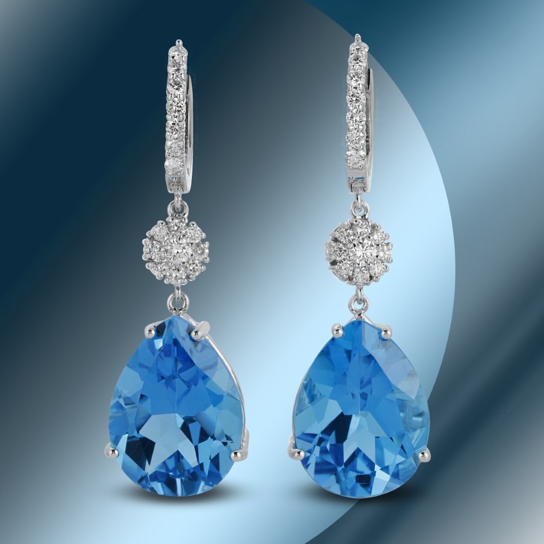 14K Gold 36.35 Blue Topaz & 1.30cts Diamond Earrings: Retail: $10,428***** 14K Gold 36.35 Blue Topaz & 1.30cts Diamond Earrings****** Metal: 14K White Gold/ Total Wt.: 16.1g/ Country Made USA// Main Stone: Topaz / Carat Total Wt: 36.35cts / Treatment: No
