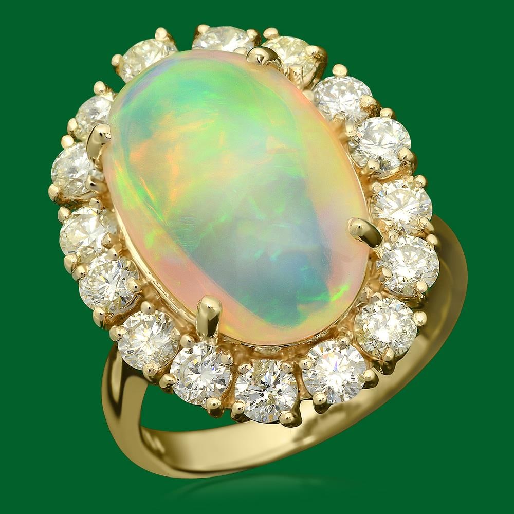 14k Gold 6.79ct Opal 2.00ct Diamond Ring: Retail: $9,580.00 ****** 14k Gold 6.79ct Opal 2.00ct Diamond Ring ****** Metal: 14k Solid Yellow Gold / Total Item Weight: 8.2 grams / Country Made: United States / / Main Stone: Opal / Color: Play of