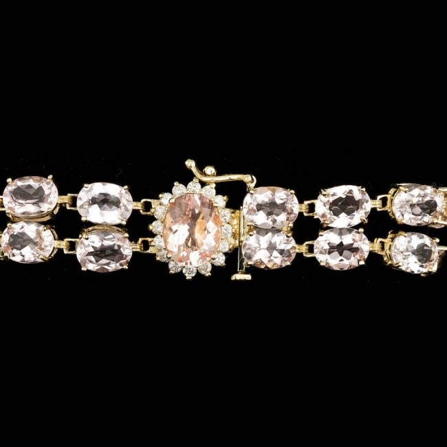 14k Gold 41.5ct Morganite 0.60ct Diamond Bracelet: Retail: $28,700.00 ****** 14k Gold 41.5ct Morganite 0.60ct Diamond Bracelet ****** Metal: 14k Solid Yellow Gold / Size: 7 / Total Item Weight: 25.0 grams / Country Made: United States / / Main Stone: 