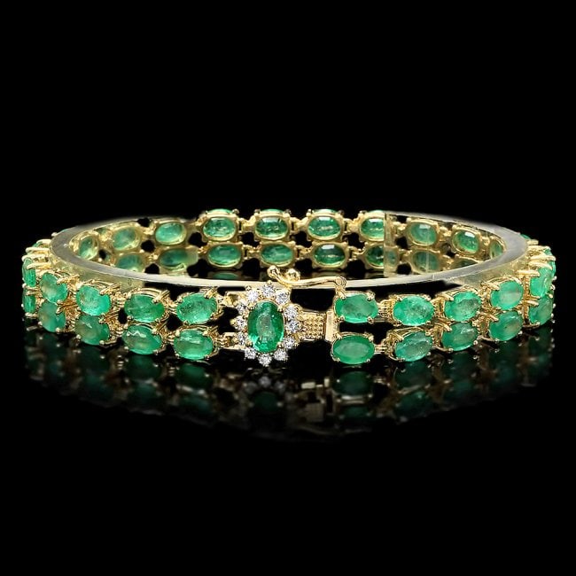 14k Gold 18ct Emerald 0.40ct Diamond Bracelet: Retail: $16,800.00 ****** 14k Gold 18ct Emerald 0.40ct Diamond Bracelet ****** Metal: 14k Solid Yellow Gold / Size: 7.25 / Total Item Weight: 17.5 grams / Country Made: United States / / Main Stone: E