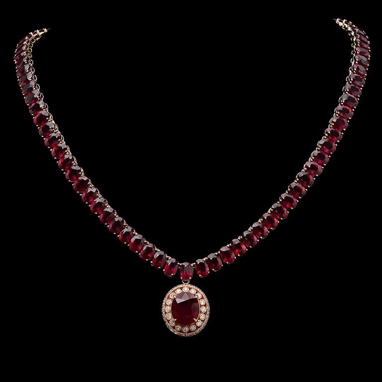 14K Gold 115.72ct Ruby & 1.35ct Diamond Necklace: Retail: $28,624.00******14K Gold Ruby & Diamond Necklace****** Metal: 14K Solid Gold / Total Item Weight: 34.6 grams/ Country Made: United States / / Main Stone: Ruby / Color: Red / Carat Total Weight