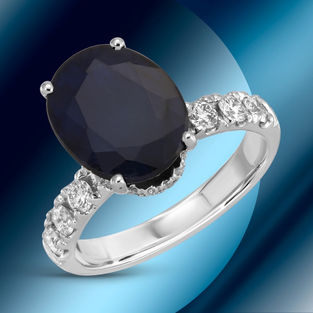 14K Gold 5.76cts Sapphire & 0.98cts Diamond Ring: Retail: $10,537*****14K Gold Sapphire & Diamond Ring*****Metal: 14K White Gold/ Total Wt.: 5.2g / Country Made US// Size 7 / Main Stone: Sapphire / Carat Total Wt.: 5.76cts / Treatment: Diffusion / Co