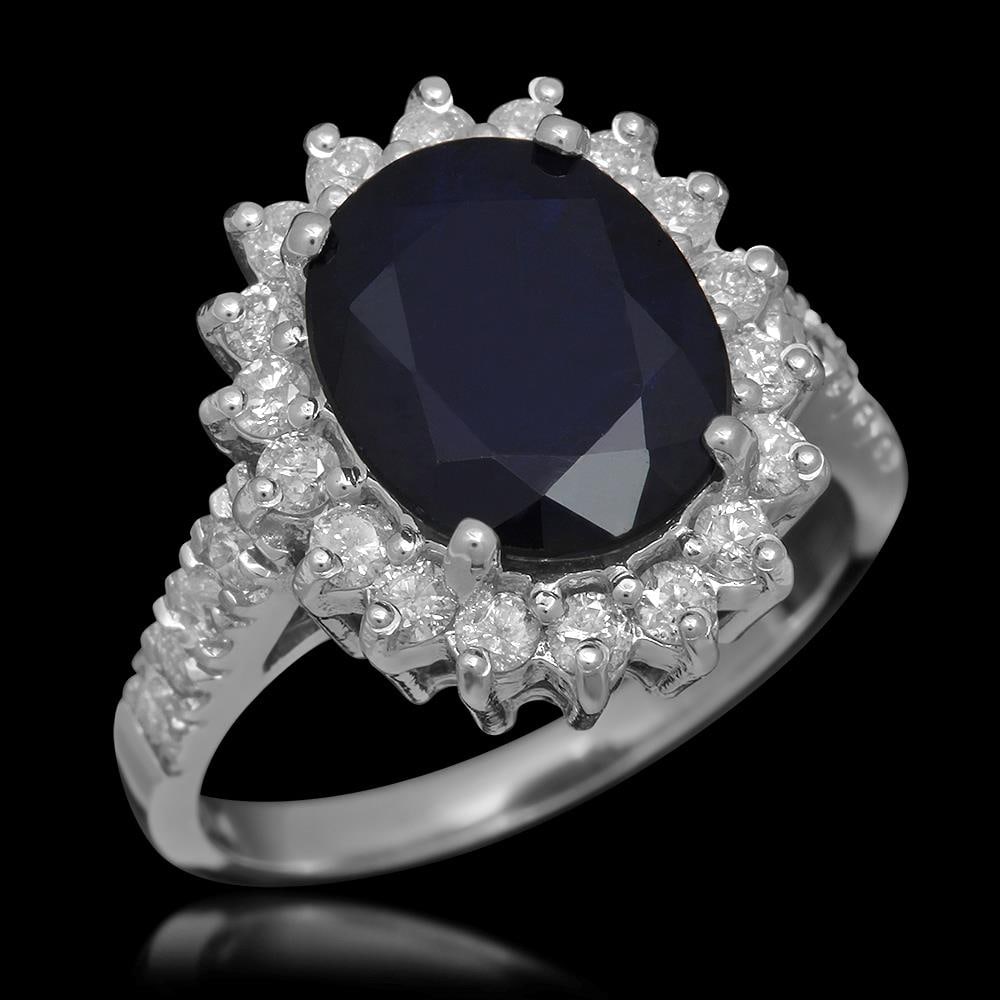 14K Gold 3.83ct Sapphire 0.78ct Diamond Ring: Retail: $4,800.00 ****** 14K Gold 3.83ct Sapphire 0.78ct Diamond Ring ****** Metal: 14K Solid Gold / Total Item Weight: 5.2 grams / Country Made: United States / / Main Stone: Sapphire / Color: Blue /