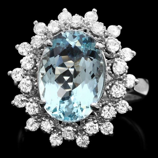 14k Gold 4.35ct Aquamarine 0.77ct Diamond Ring: Retail: $6,800.00 ****** 14k Gold 4.35ct Aquamarine 0.77ct Diamond Ring ****** Metal: 14k Solid White Gold / Size: 7.25 / Total Item Weight: 5.2 grams / Country Made: United States / / Main Stone: Aqu