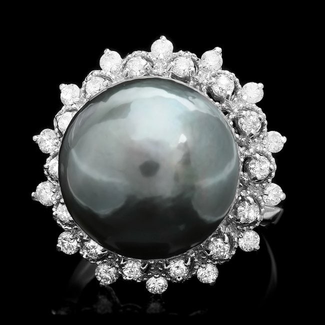14k White Gold 14mm Pearl 0.70ct Diamond Ring: Retail: $6,200.00 ****** 14k White Gold 14mm Pearl 0.70ct Diamond Ring ****** Metal: 14k Solid White Gold / Size: 7 / Total Item Weight: 10.0 grams / Country Made: United States / / Main Stone: Pearl 