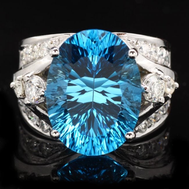 14k White Gold 11.00ct Topaz 1.10ct Diamond Ring: Retail: $6,750.00 ****** 14k White Gold 11.00ct Topaz 1.10ct Diamond Ring ****** Metal: 14k Solid White Gold / Size: 6.5 / Total Item Weight: 10.5 grams / Country Made: United States / / Main Stone: T