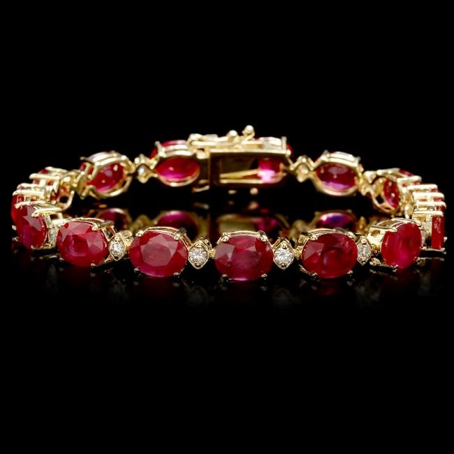 14k Gold 34.50ct Ruby 1.15ct Diamond Bracelet: Retail: $17,300.00 ****** 14k Gold 34.50ct Ruby 1.15ct Diamond Bracelet ****** Metal: 14k Solid Yellow Gold / Size: 7 / Total Item Weight: 22.3 grams / Country Made: United States / / Main Stone: Ruby