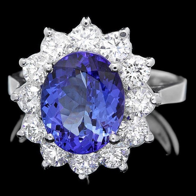14k Gold 4.00ct Tanzanite 1.60ct Diamond Ring: Retail: $13,900.00 ****** 14k Gold 4.00ct Tanzanite 1.60ct Diamond Ring ****** Metal: 14k Solid White Gold / Size: 7 / Total Item Weight: 6.0 grams / Country Made: United States / / Main Stone: