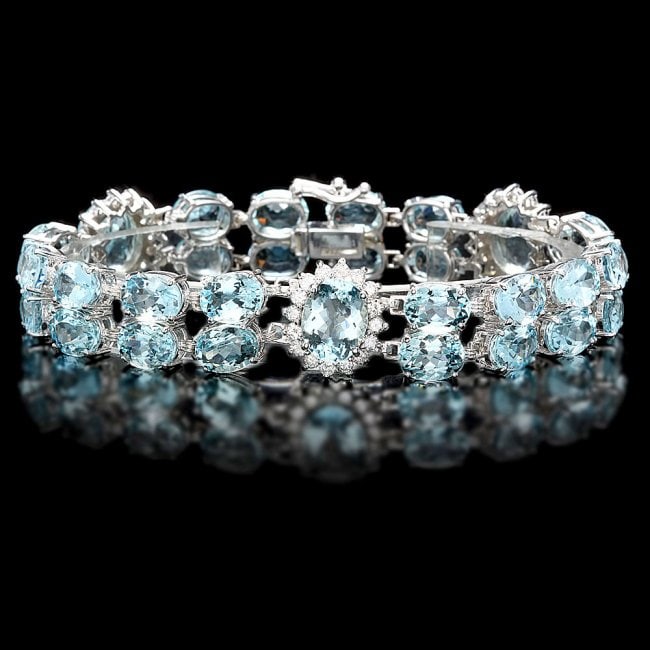 14k Gold 40ct Aquamarine 1.85ct Diamond Bracelet: Retail: $16,500.00 ****** 14k Gold 40ct Aquamarine 1.85ct Diamond Bracelet ****** Metal: 14k Solid White Gold / Size: 7.5 / Total Item Weight: 26.5 grams / Country Made: United States / / Main Stone: 