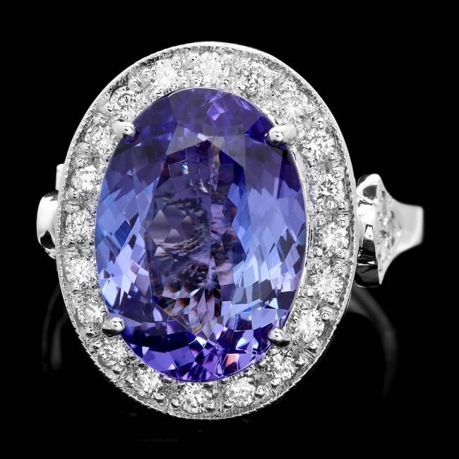 14k Gold 7.00ct Tanzanite 0.70ct Diamond Ring: Retail: $18,750.00 ****** 14k Gold 7.00ct Tanzanite 0.70ct Diamond Ring ****** Metal: 14k Solid White Gold / Size: 7 / Total Item Weight: 7.5 grams / Country Made: United States / / Main Stone: Tanzan