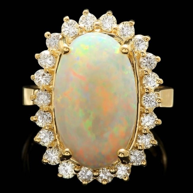 14k Yellow Gold 4.00ct Opal 1.10ct Diamond Ring: Retail: $8,500.00 ****** 14k Yellow Gold 4.00ct Opal 1.10ct Diamond Ring ****** Metal: 14k Solid Yellow Gold / Size: 6.75 / Total Item Weight: 7.3 grams / / Main Stone: Opal / Color: White / Carat Tot