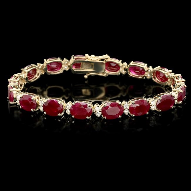 14k Gold 28.00ct Ruby 1.40ct Diamond Bracelet: Retail: $21,600.00 ****** 14k Gold 28.00ct Ruby 1.40ct Diamond Bracelet ****** Metal: 14k Solid Yellow Gold / Size: 7.5 / Total Item Weight: 19.5 grams / Country Made: United States / / Main Stone: Ru
