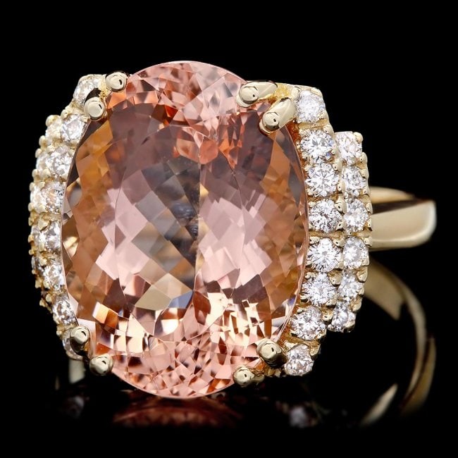 14k Gold 12ct Morganite 0.60ct Diamond Ring: Retail: $12,300.00 ****** 14k Solid Yellow Gold 12.00ct Natural Morganite 0.60ct Diamond Ring ****** Metal: 14k Solid Yellow Gold / Size: 7 / Total Item Weight: 8.5 grams / Country Made: United States