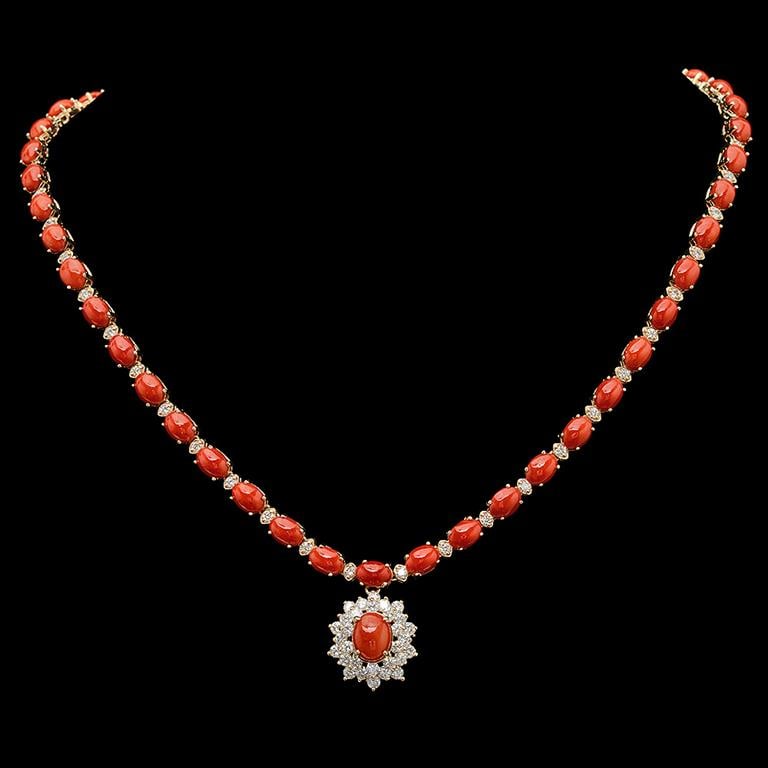 14K Gold 30.93ct Coral & 2.85ct Diamond Necklace: Retail: $26,670.00******14K Gold Coral & Diamond Necklace****** Metal: 14K Solid Gold / Total Item Weight: 27.9 grams/ Country Made: United States / / Main Stone: Ruby / Color: Reddish Orange / Carat 