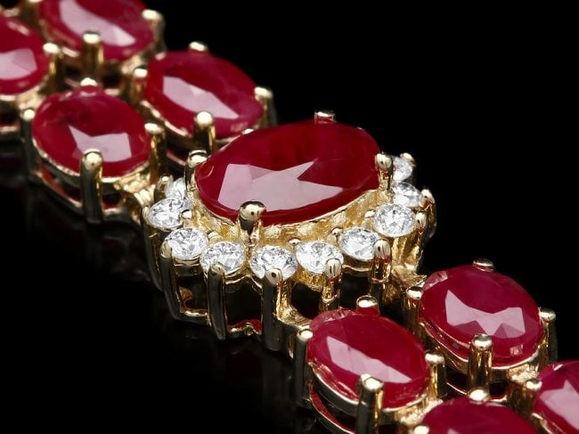 14k Yellow Gold 27ct Ruby 1.30ct Diamond Bracelet: Retail: $21,200.00 ****** 14k Yellow Gold 27ct Ruby 1.30ct Diamond Bracelet ****** Metal: 14k Solid Yellow Gold / Size: 7 / Total Item Weight: 20 grams / Country Made: United States / / Main Stone: Ru