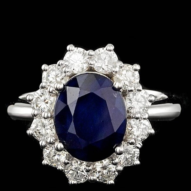 14k Gold 4.00ct Sapphire 1.10ct Diamond Ring: Retail: $8,200.00 ****** 14k Gold 4.00ct Sapphire 1.10ct Diamond Ring ****** Metal: 14k Solid White Gold / Size: 6.5 / Total Item Weight: 6.0 grams / Country Made: United States / / Main Stone: Sapphi