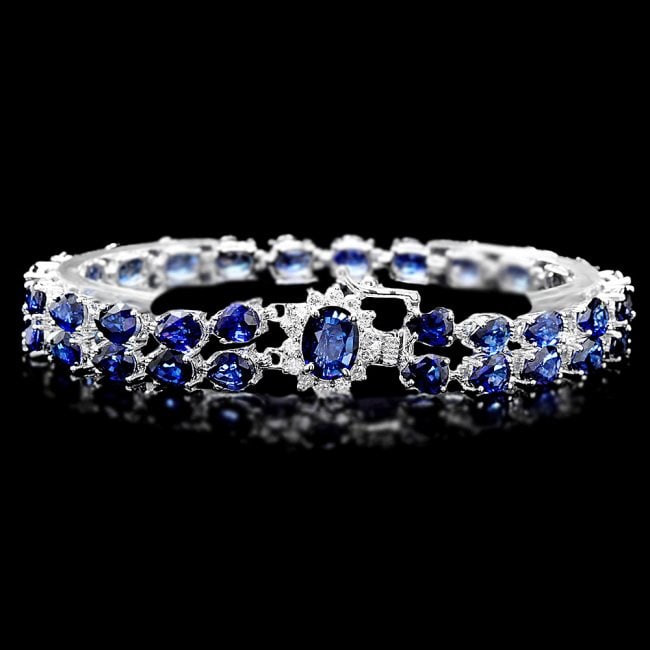 14k Gold 26ct Sapphire 0.60ct Diamond Bracelet: Retail: $9,500.00 ****** 14k Gold 26ct Sapphire 0.60ct Diamond Bracelet ****** Metal: 14k Solid White Gold / Size: 7.5 / Total Item Weight: 19.5 grams / Country Made: United States / / Main Stone: Sap