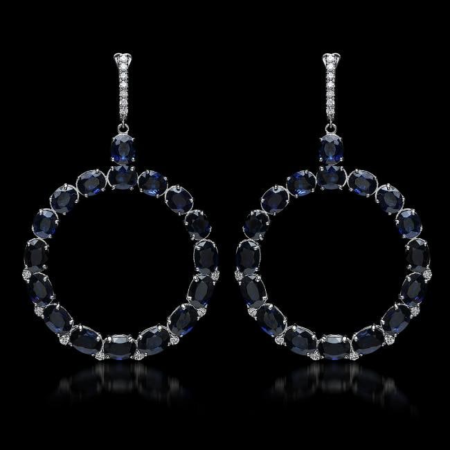 14K Gold 30.46ct Sapphire 0.52ct Diamond Earrings: Retail: $16,000.00******14K Gold 30.46ct Sapphire 0.52ct Diamond Earrings****** Metal: 14K Solid White Gold / Total Item Weight: 20.5 grams / Country Made: United States / / Main Stone: Sapphire / Col