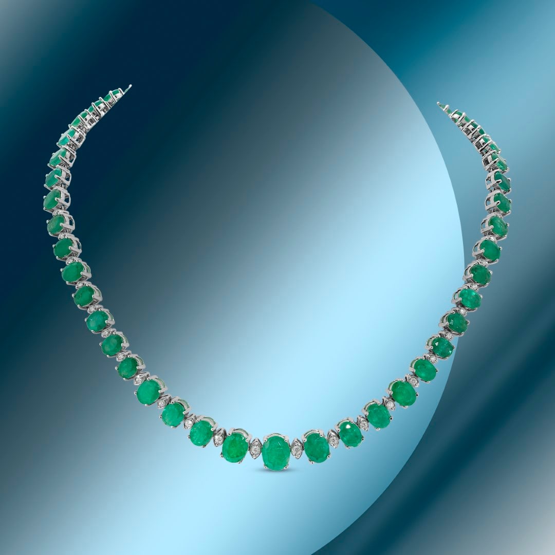 14K Gold 52.41cts Emerald & 1.80cts Diamond Necklace: Retail: $75,346***** 14K Gold 52.41cts Emerald & 1.80cts Diamond Necklace****** Metal: 14K White Gold/ Total Wt.: 40.6g/ Country Made USA// Main Stone: Emerald / Carat Total Wt: 52.41cts / Treatment: 