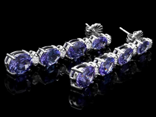 14k Gold 9.50ct Tanzanite 0.50ct Diamond Earrings: Retail: $7,500.00 ****** 14k Gold 9.50ct Tanzanite 0.50ct Diamond Earrings ****** Metal: 14k Solid White Gold / Total Item Weight: 7.5 grams / Country Made: United States / / Main Stone: Tanzanite / C